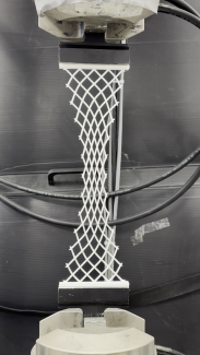 Pantographic sheet under tension